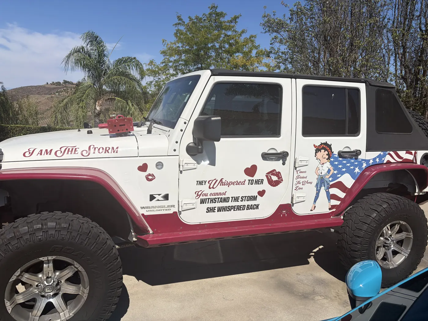 Christine's custom red, white and blue Jeep, a personal symbol of resilience